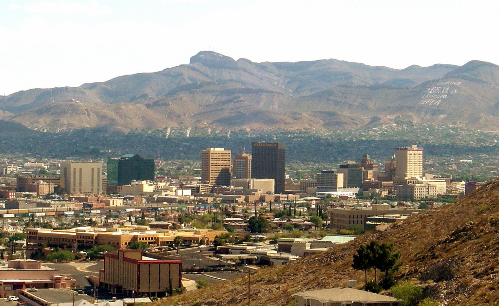From El Paso's Franklin Mountains, around which the entire city of El Paso curves, is the view of downtown El Paso and the high hills of Juarez