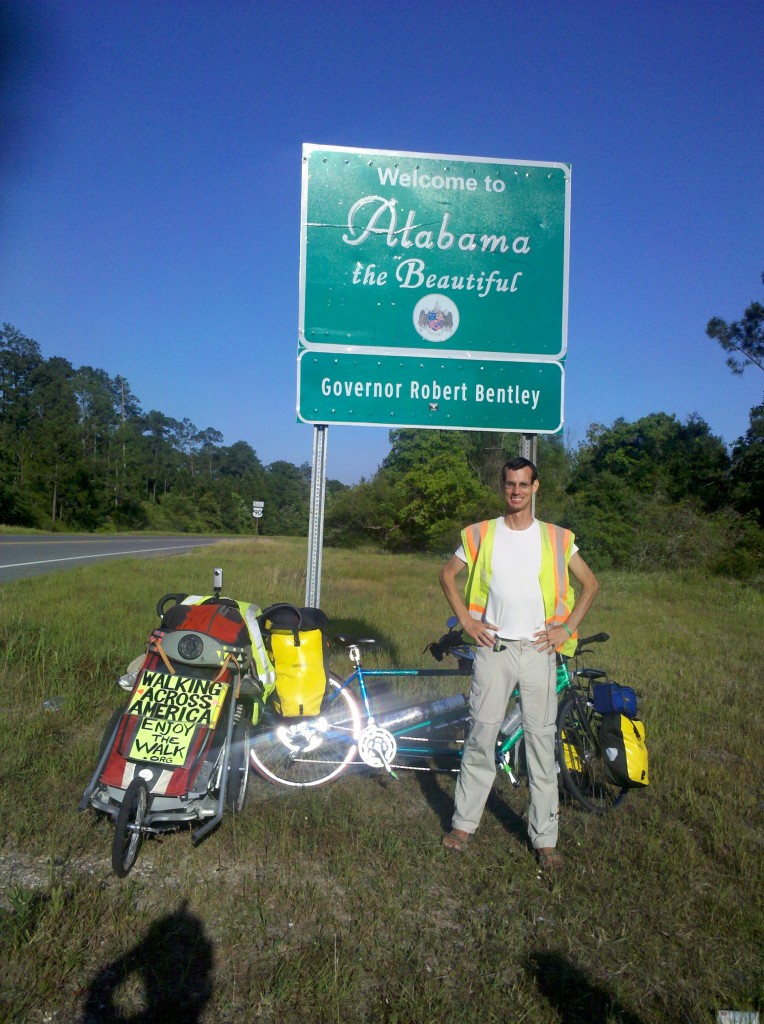 At the Alabama border, I met a baby boomer couple riding across America on a tandem bike. Like me, they're from Washington State. However, they started their bicycle trip in California. Nice people-- we exchanged pic favors before bidding one another farewell. Pictured here, I'm about to step into Alabama for the first time. How Exciting!!  Of course, I still don't yet know where I'll be resting my head this night... :) 